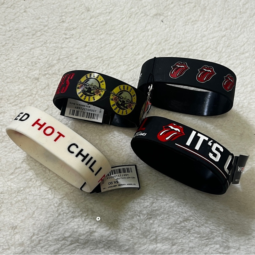 Bundle of 4 Rubber Rock Band Bracelets NWT